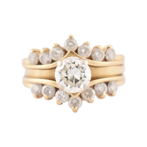 331 - A 14ct gold Diamonique CZ stacking ring. The ring in three parts all set with CZ. Stamped CZ DQ 14k.... 