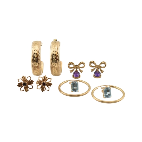 338 - A collection of 9ct gold and gem set earrings. The earrings to include hoops, amethyst, bow pendant ... 