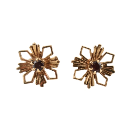 338 - A collection of 9ct gold and gem set earrings. The earrings to include hoops, amethyst, bow pendant ... 