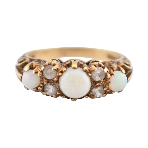 339 - A hallmarked 9ct gold five stone opal and white stone ring. Hallmarked London, sponsors mark H&S... 