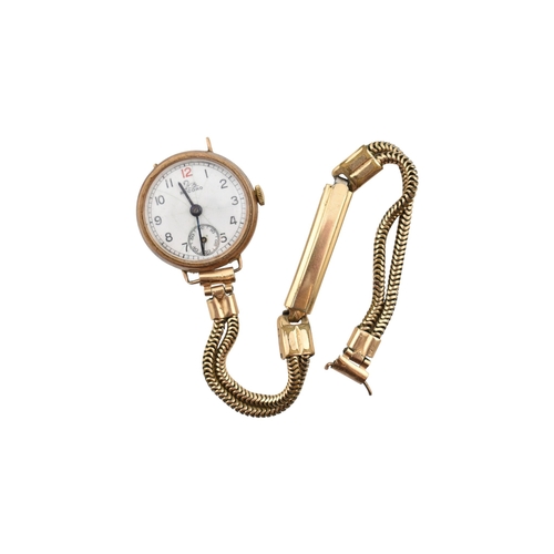 344 - A 9ct gold ' Record ' wristwatch. Arabic number dial with seconds dial at the 6 position. Set to a r... 