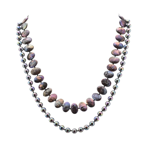345 - A 9ct gold and baroque pearl necklace. Weight 25g. Measures 42cm. Together with a simulated black pe... 
