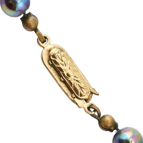 345 - A 9ct gold and baroque pearl necklace. Weight 25g. Measures 42cm. Together with a simulated black pe... 