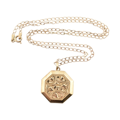 346 - A hallmarked 9ct gold locket pendant necklace. The locket plastic glazed with felt lining to interio... 