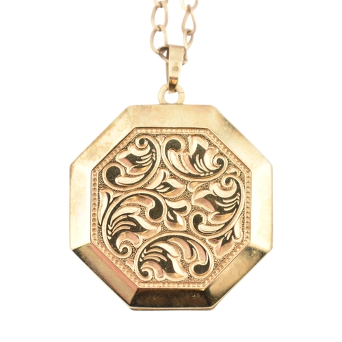 346 - A hallmarked 9ct gold locket pendant necklace. The locket plastic glazed with felt lining to interio... 