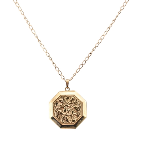 346 - A hallmarked 9ct gold locket pendant necklace. The locket plastic glazed with felt lining to interio... 