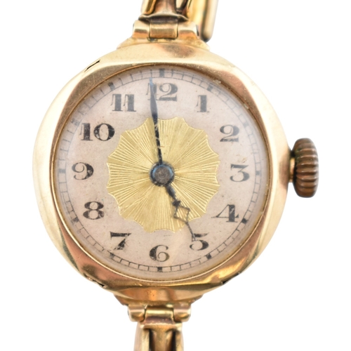 349 - An 1930s hallmarked 9ct gold watch on an expanding gold on silver strap. Hallmarked Chester 1932. AF... 
