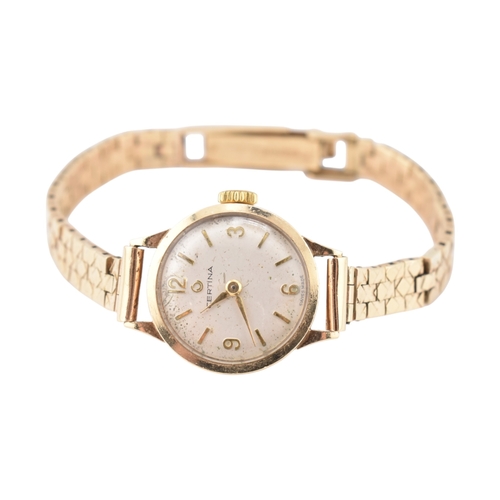 351 - A Certina 9ct gold watch. The watch with a champagne dial and dagger hands. Total weight 17.7g. Meas... 