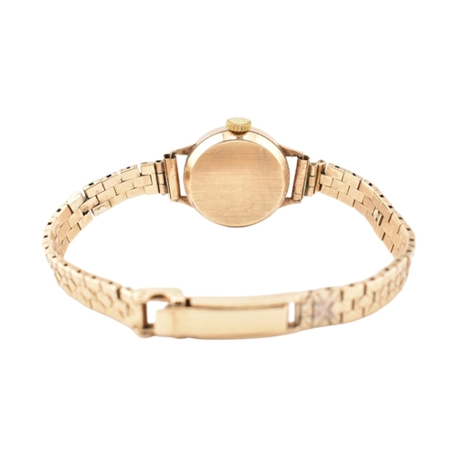 351 - A Certina 9ct gold watch. The watch with a champagne dial and dagger hands. Total weight 17.7g. Meas... 