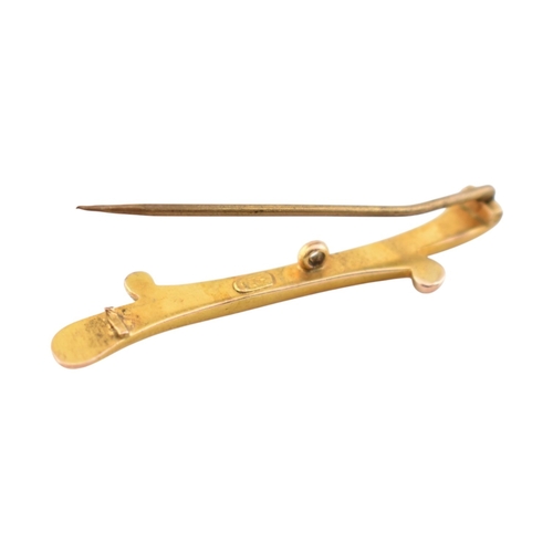 356 - A 9ct gold bar brooch pin together with two other brooch pins one stamped 9ct another unmarked with ... 