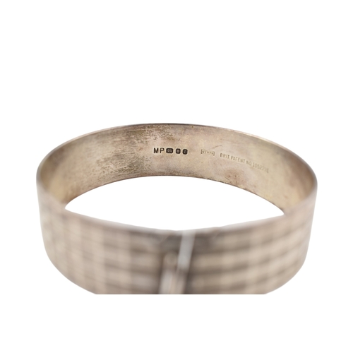 359 - A 1970s Maylin products hallmarked silver bangle together with silver panel bracelet. Hallmarked Lon... 