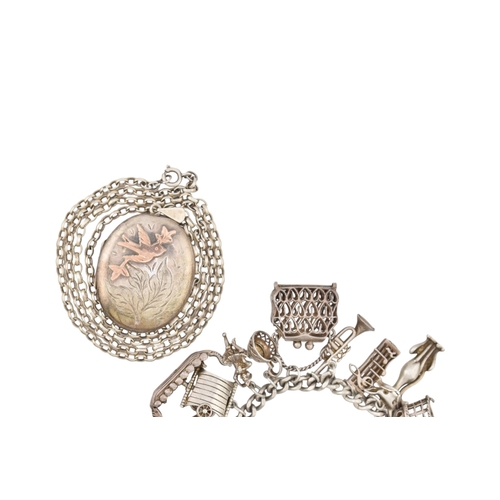 362 - A collection of silver jewellery to include a hallmarked silver charm bracelet. Together with a hall... 