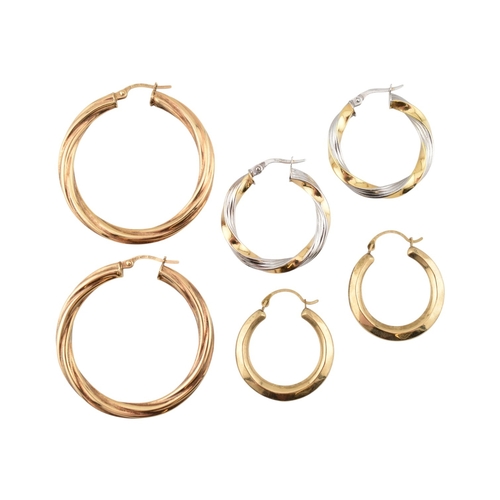 363 - A collection of 9ct gold earrings to include creole hoop earrings, bi-colour and twisted examples. A... 