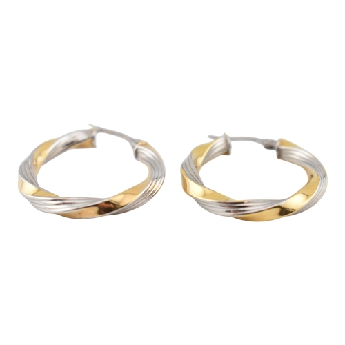 363 - A collection of 9ct gold earrings to include creole hoop earrings, bi-colour and twisted examples. A... 