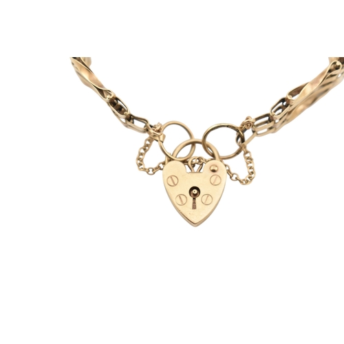 364 - A hallmarked 9ct gold gate link bracelet. Hallmarked London, sponsors mark ASJ. Weight 8.9g. Measure... 