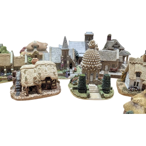 338 - Lilliput Lane - A collection of vintage 20th century resin cottage house figures. Including St Steph... 