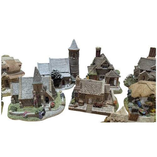 338 - Lilliput Lane - A collection of vintage 20th century resin cottage house figures. Including St Steph... 