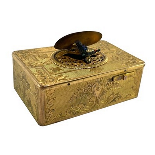A circa 1900 Continental gilt brass musical automata box. With an ...