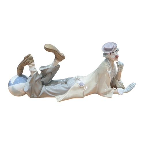 74 - Lladro - A vintage 20th century Lladro Spanish porcelain clown figure. Model no. 4618, Lying Clown (... 