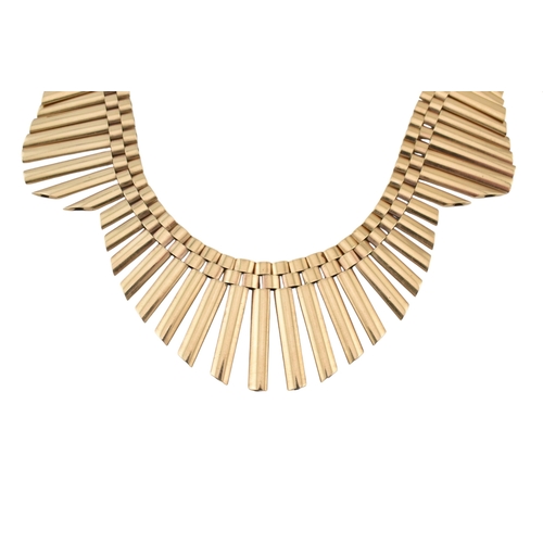 3 - A 1950s hallmarked 9ct gold Cleopatra fringe collar necklace. The necklace with undulating gold link... 