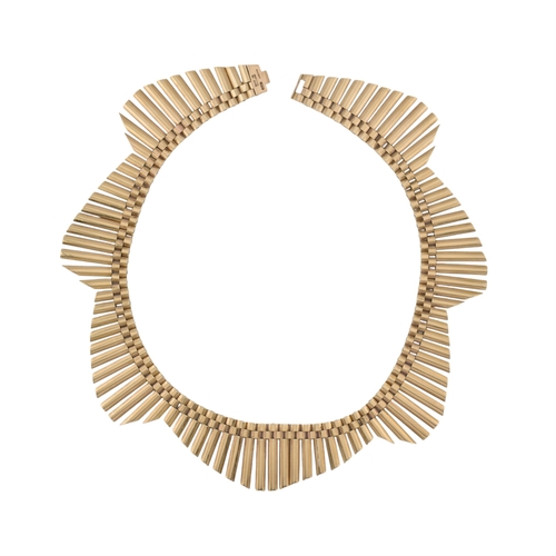 3 - A 1950s hallmarked 9ct gold Cleopatra fringe collar necklace. The necklace with undulating gold link... 