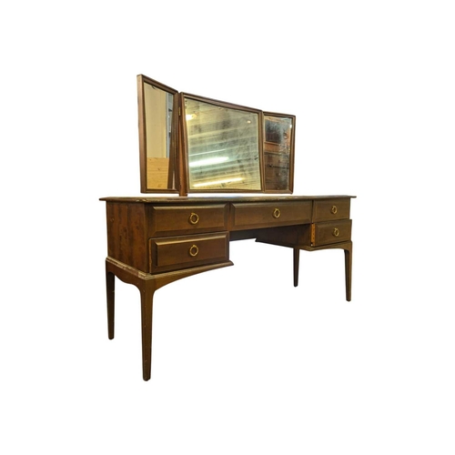 614 - Stag Furniture - Minstrel Range - vintage 20th century mahogany dressing table. Having knee hole cen... 