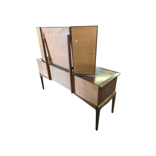 614 - Stag Furniture - Minstrel Range - vintage 20th century mahogany dressing table. Having knee hole cen... 