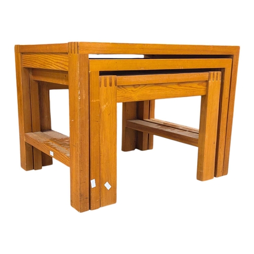 615 - British Contemporary Design - A modern oak nest of three rectangular tables with exposed dovetail de... 