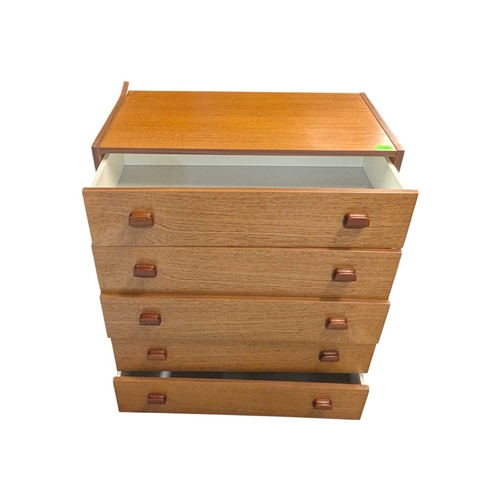 620 - Danish Modern Design - Late 20th century teak veneer chest of drawers. Having a bank of five drawers... 