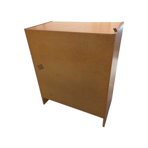 620 - Danish Modern Design - Late 20th century teak veneer chest of drawers. Having a bank of five drawers... 