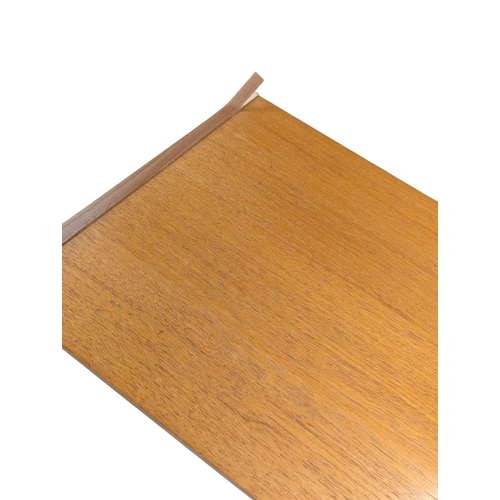 620 - Danish Modern Design - Late 20th century teak veneer chest of drawers. Having a bank of five drawers... 