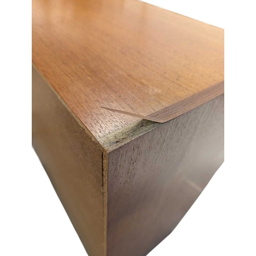 620 - Danish Modern Design - Late 20th century teak veneer chest of drawers. Having a bank of five drawers... 