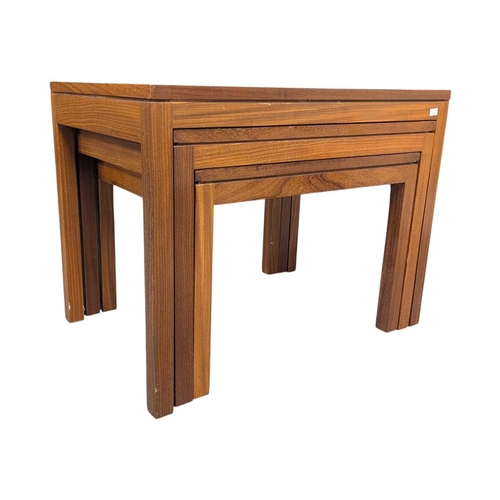 621 - British Modern Design - A set of mid century teak nesting tables. The nest of tables all with gradua... 