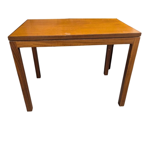 621 - British Modern Design - A set of mid century teak nesting tables. The nest of tables all with gradua... 