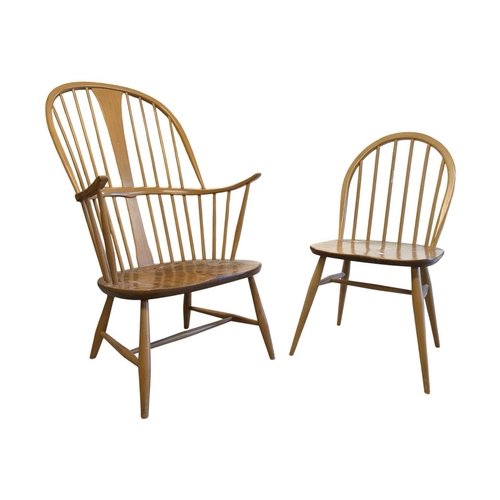 626 - Ercol Furniture - A 20th century Ercol comb-back double bow ' Chairmakers ' Windsor armchair. Of bee... 