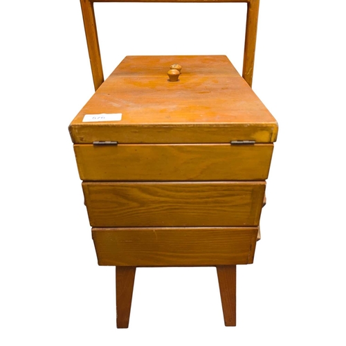 628 - British Modern Design - A mid 20th century stained teak metamorphic / cantilever sewing box / chest.... 