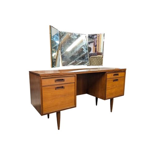 629 - White & Newton Furniture - Vintage mid 20th century teak dressing table. Knee hole centre flanke... 