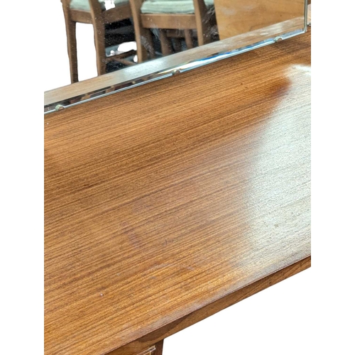 629 - White & Newton Furniture - Vintage mid 20th century teak dressing table. Knee hole centre flanke... 