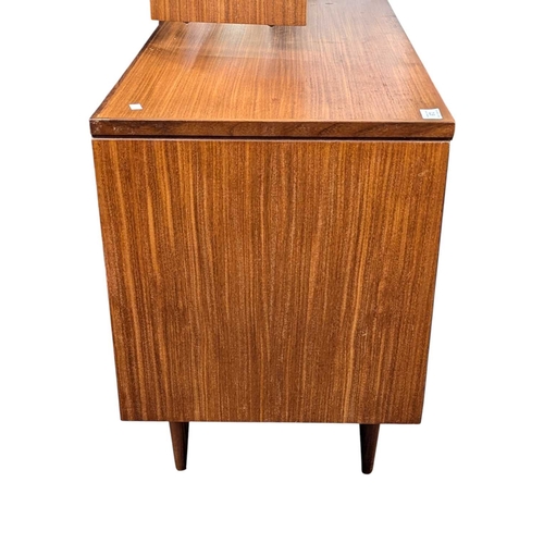 629 - White & Newton Furniture - Vintage mid 20th century teak dressing table. Knee hole centre flanke... 