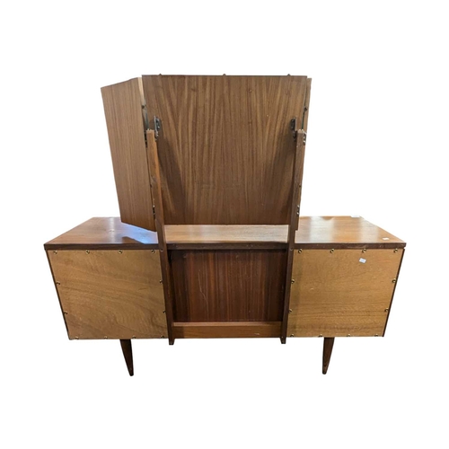 629 - White & Newton Furniture - Vintage mid 20th century teak dressing table. Knee hole centre flanke... 