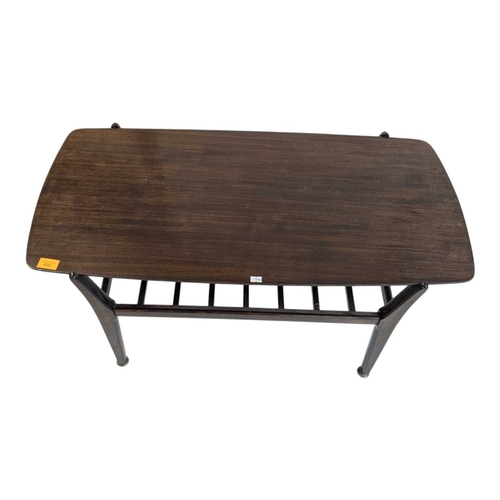 630 - British Modern Design - Mid century teak wood coffee occasional table raised on shaped legs with mag... 