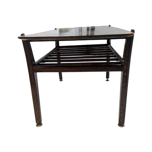 630 - British Modern Design - Mid century teak wood coffee occasional table raised on shaped legs with mag... 