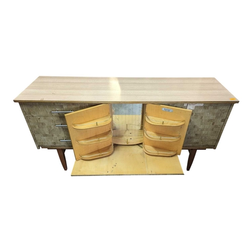 633 - Beautility Furniture - A vintage 20th century Formica sideboard credenza. Chequered formica design t... 