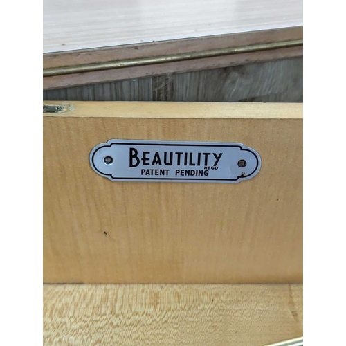 633 - Beautility Furniture - A vintage 20th century Formica sideboard credenza. Chequered formica design t... 