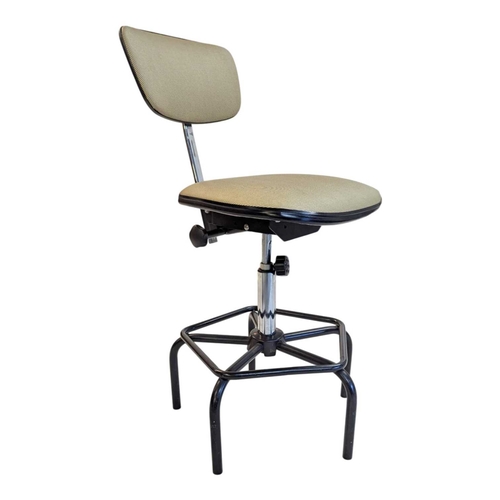 636 - A Dauphin industrial / machinist's swivel chair with moulded plastic seat and back rest with upholst... 