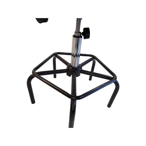 636 - A Dauphin industrial / machinist's swivel chair with moulded plastic seat and back rest with upholst... 