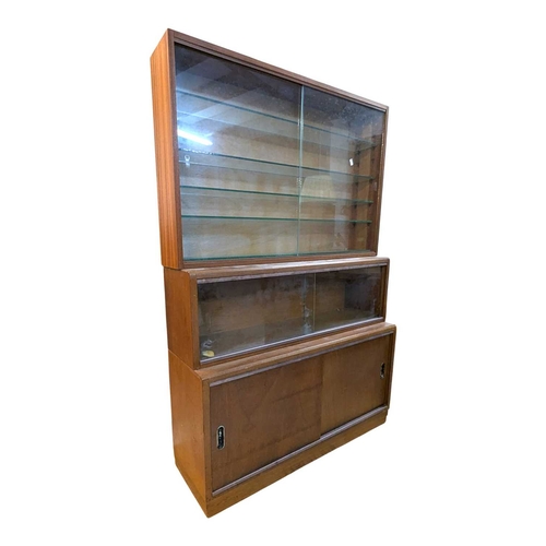 637 - British Modern Design - A vintage 20th century teak stacking display cabinet bookcase. Rectangular f... 