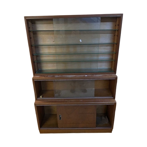 637 - British Modern Design - A vintage 20th century teak stacking display cabinet bookcase. Rectangular f... 