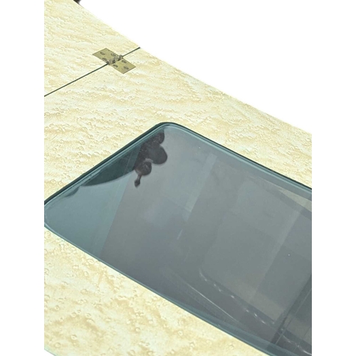 639 - A vintage Art Deco style painted cocktail / drinks portable bar. In a matt green finish, with a fold... 