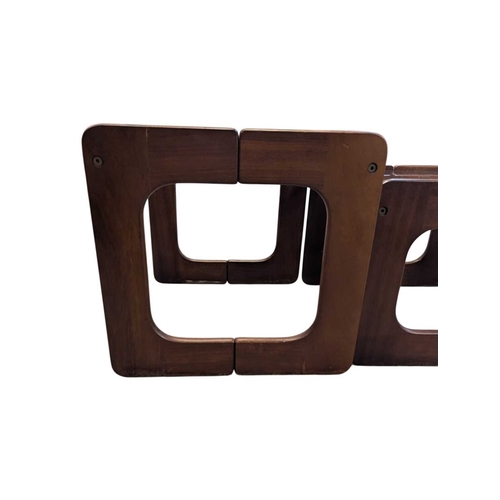 640 - British Modern Design - A vintage 20th century teak and smoked glass nest of tables. Rectangular for... 